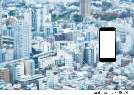 スマホ 携帯電話 スマートフォン 都市風景 東京 不動産イメージ スマホ 携帯電話 スマートフォン 都市風景 東京 不動産イメージ 27280742