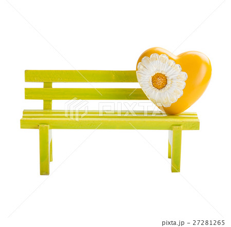 Green toy bench and yellow heart Green toy bench and yellow heart 27281265