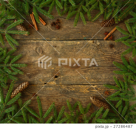 Christmas tree branch with cones, cinnamon sticks Christmas tree branch with cones, cinnamon sticks 27286487