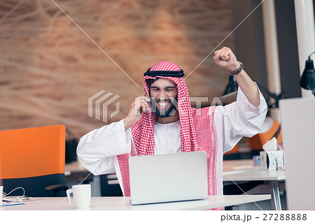 Arabian businessman working in modern startup 27288888