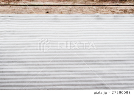 Fabric background, kitchen napkin on wooden table Fabric background, kitchen napkin on wooden table 27290093