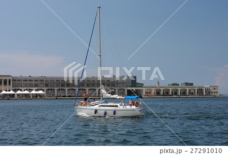 Sailboat arrives to harbor in Trieste, Italy Sailboat arrives to harbor in Trieste, Italy 27291010