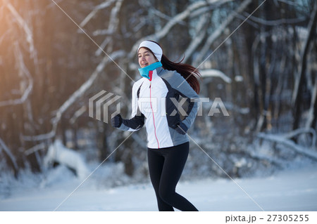 Girl on jog among forest Girl on jog among forest 27305255