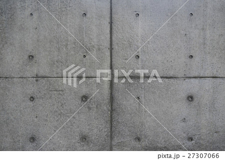 コンクリート打ちっ放し仕上げ外壁コールドジョイント補修ピーコン跡背景壁紙素材concreteの写真素材