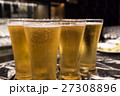 Glass of beer served on the counter in a party 27308896