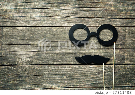 fake glasses and mustaches on sticks 27311408
