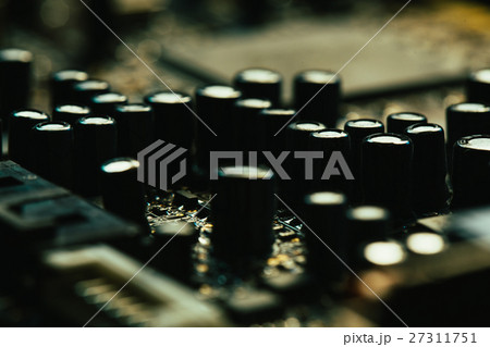 Computer motherboard closeup yellow gray color 27311751