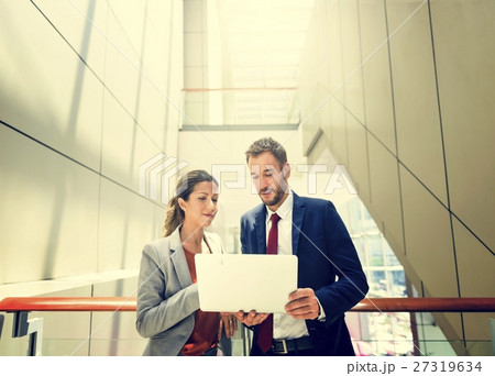 Business People Discussion Laptop Technology Togetherness Concep 27319634