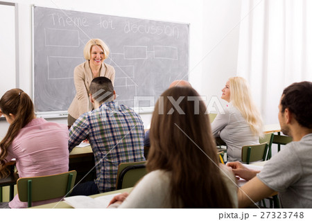 Professionals and coach at training Professionals and coach at training 27323748