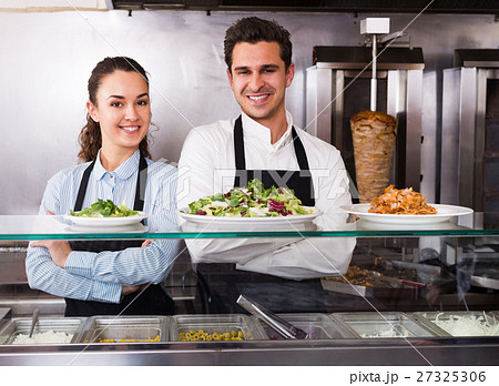 Portrait of two ordinary workers with kebab Portrait of two ordinary workers with kebab 27325306