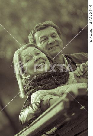 Portrait of elderly couple in park Portrait of elderly couple in park 27325444