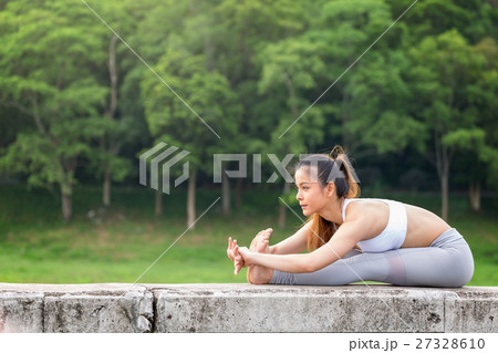 Fitness Asia woman stretching arms Fitness Asia woman stretching arms 27328610