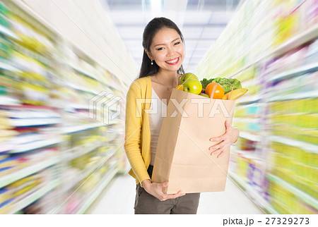 Buying groceries in market 27329273
