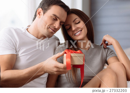 Joyful happy couple celebrating Valentines Day Joyful happy couple celebrating Valentines Day 27332203