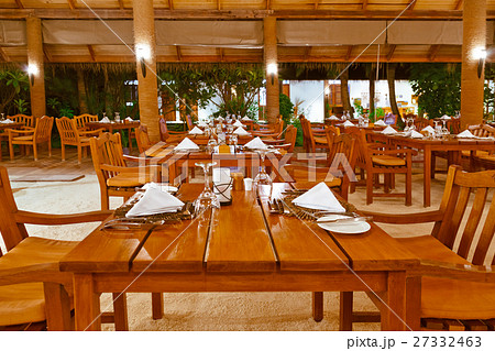 Glasses and plates on table in restaurant Glasses and plates on table in restaurant 27332463
