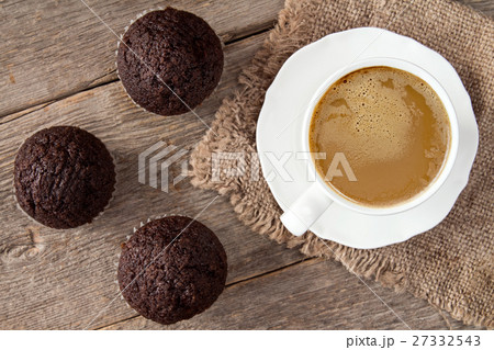 Chocolate cupcakes and cup of cappuchino 27332543