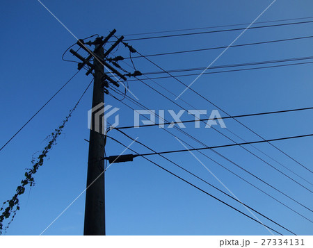 telephone pole under blue sky, twilight 27334131