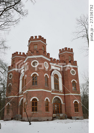 Red brick building with four towers 27336792