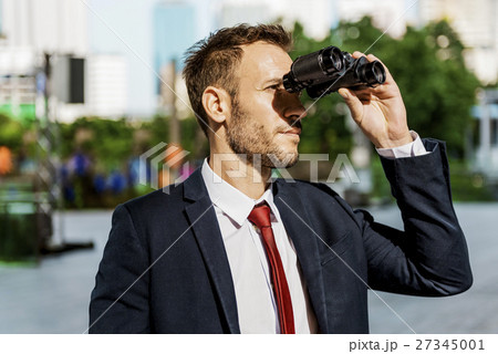 Businessman Binoculars Vision Strategy the Way Forward Concept Businessman Binoculars Vision Strategy the Way Forward Concept 27345001