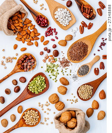 Various legumes and different kinds of nutshell. 27348888