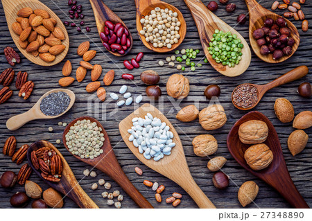 Various legumes and different kinds of nutshell. 27348890