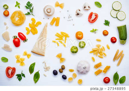 Various kind of pasta with ingredients . 27348895