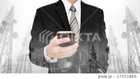 Businessman using smart phone Businessman using smart phone 27351869