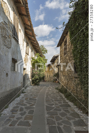 Narrow medieval street in Smartno, Slovenia. Narrow medieval street in Smartno, Slovenia. 27358280