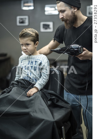 Small kid in barbershop 27358291