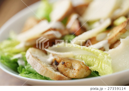 macro shot of fresh homemade caesar salad with 27359114