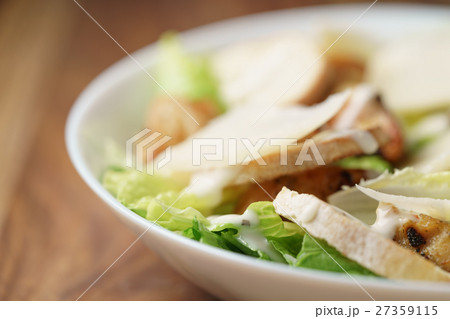 macro shot of fresh homemade caesar salad with 27359115