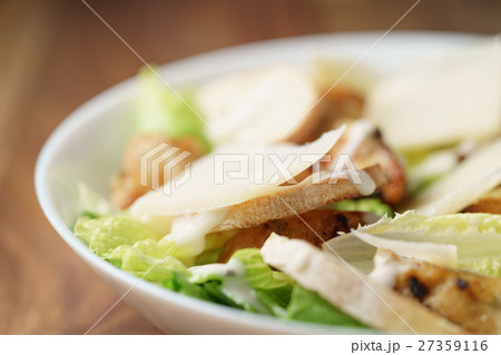 macro shot of fresh homemade caesar salad with 27359116
