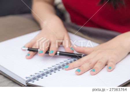 Women hand writing on blank notebook 27363764