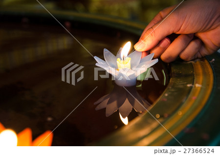 People hand release Lotus flower candle lighting 27366524