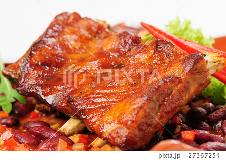 Roasted pork ribs with vegetables 27367254