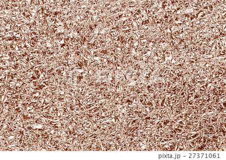 Shiny foil texture for background. Rose gold color Shiny foil texture for background. Rose gold color 27371061