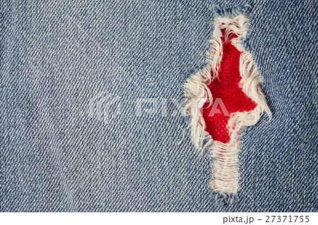 Jeans torn denim texture. 27371755