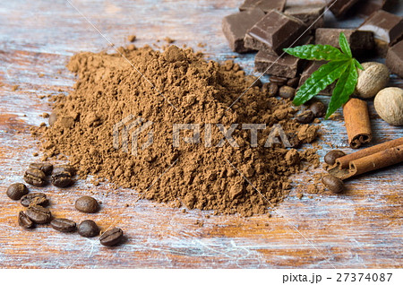 Cacao powder with chocolate and cinnamon 27374087