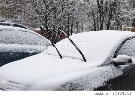 car in a winter morning with snow covered car in a winter morning with snow covered 27374212
