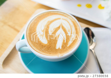 Delicious cup of coffee delicious cakes in coffee  27380038