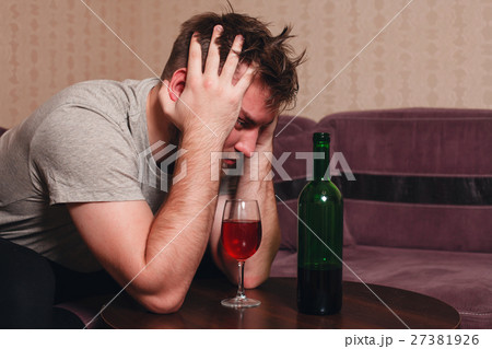 Stressed man after hard drinking. 27381926