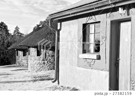 in lesotho  street village near   mountain 27382159