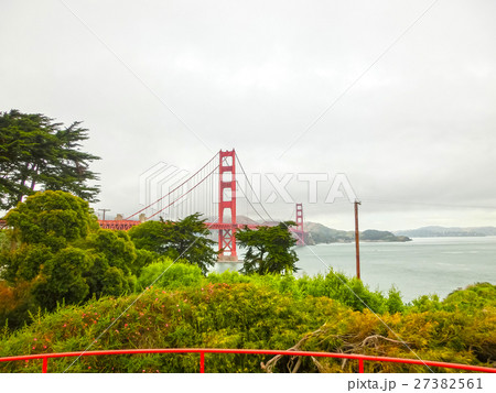 The gold gate bridge in a fog in San Francisco The gold gate bridge in a fog in San Francisco 27382561