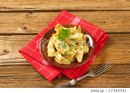 plate of marinated artichokes 27384581