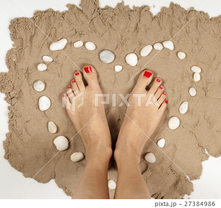female legs pedicure red nail  27384986