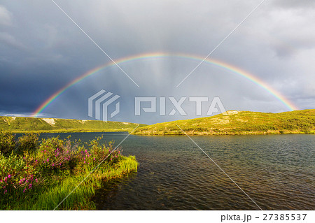 Rainbow in mountains Rainbow in mountains 27385537