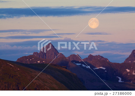 Moon above rocky peaks 27386000