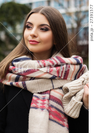 Pretty teen girl is wearing warm winter clothes Pretty teen girl is wearing warm winter clothes 27391577