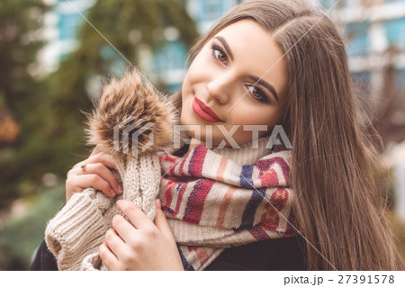 Pretty teen girl is wearing warm winter clothes Pretty teen girl is wearing warm winter clothes 27391578