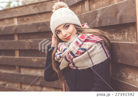 Pretty girl is wearing warm winter clothes Pretty girl is wearing warm winter clothes 27391592